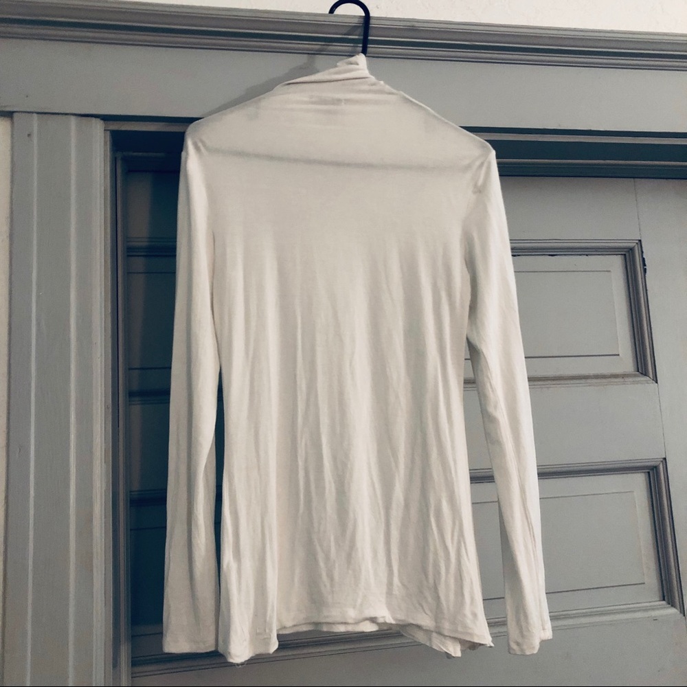 Semi sheer white turtleneck
